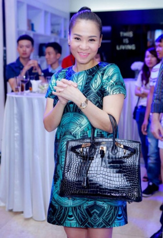 Thời trang bầu bí sành điệu hơn người của Thu Minh