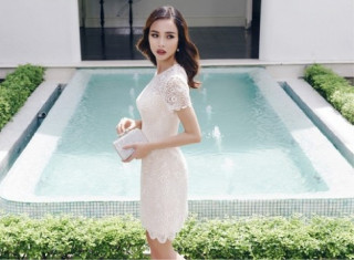 Vũ Ngọc Anh hững hờ vòng 1 với áo lụa thướt tha